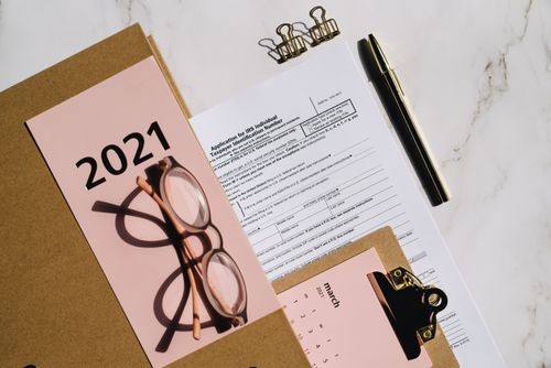 Investor reviewing tax planning paperwork at a desk